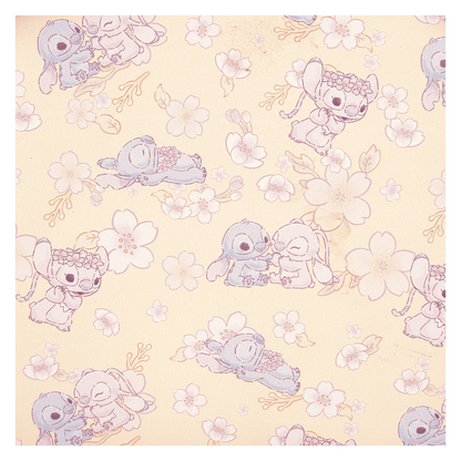 Pattern of Stitch & Angel Cherry Blossom characters and flowers on a light yellow background
