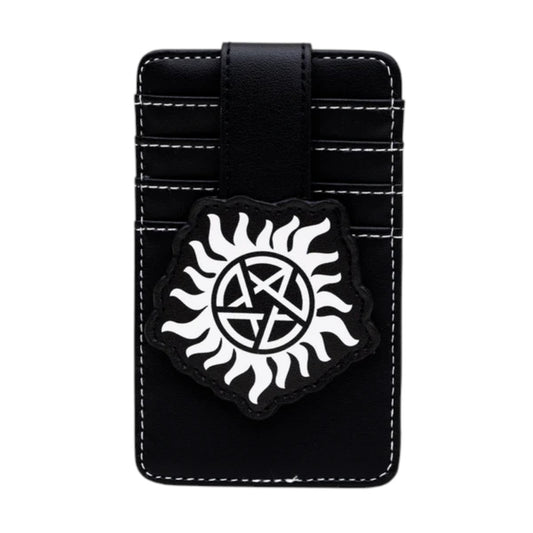 Black faux leather money clip wallet with white contrast stitching and a black and white pentagram sun patch on the front from the television show Supernatural.
