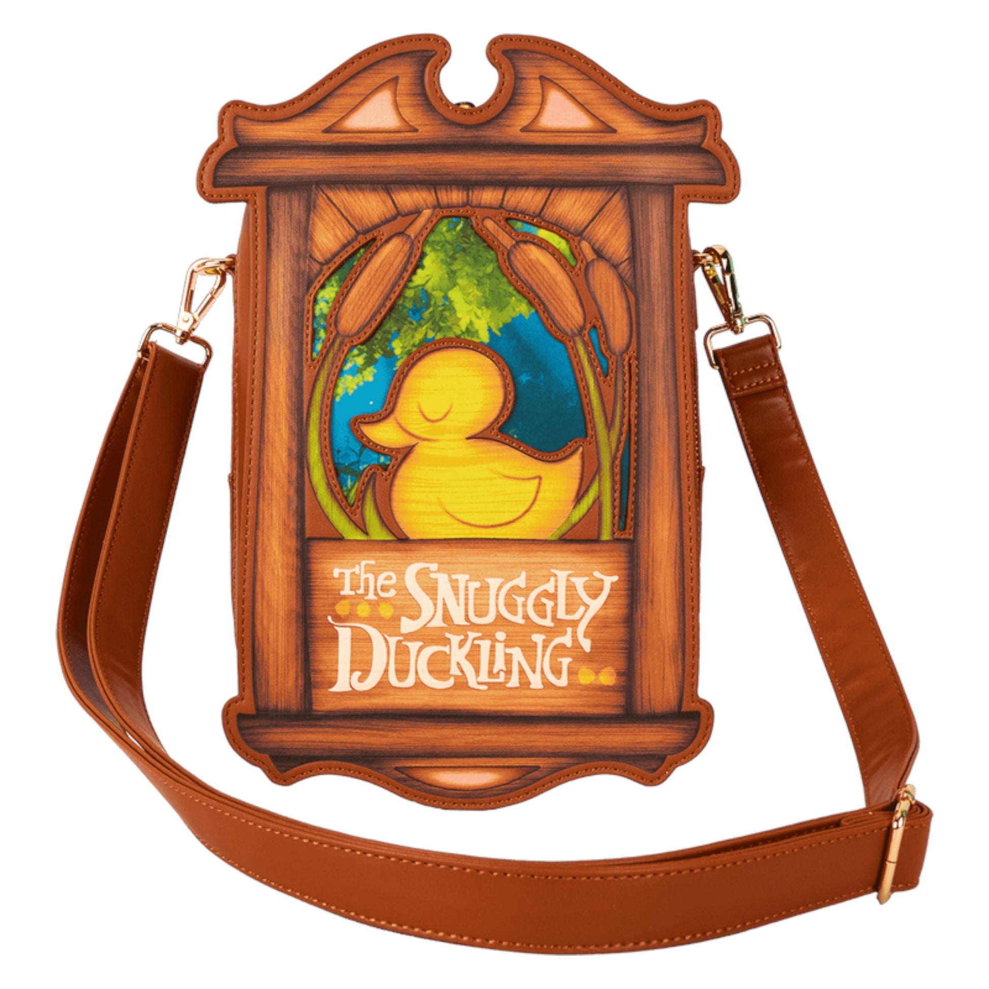 Crossbody bag with snuggly duckling illustration and 'The Snuggly Duckling' text, framed in wood a brown leather strap with gold hardware on a white background