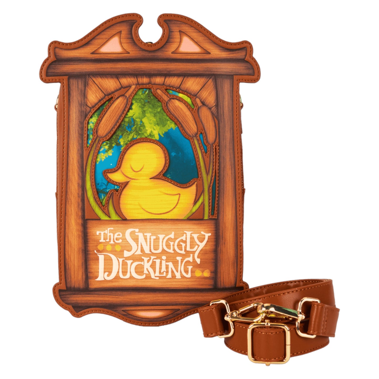 Crossbody bag with snuggly duckling illustration and 'The Snuggly Duckling' text, framed in wood a brown leather strap with gold hardware on a white background