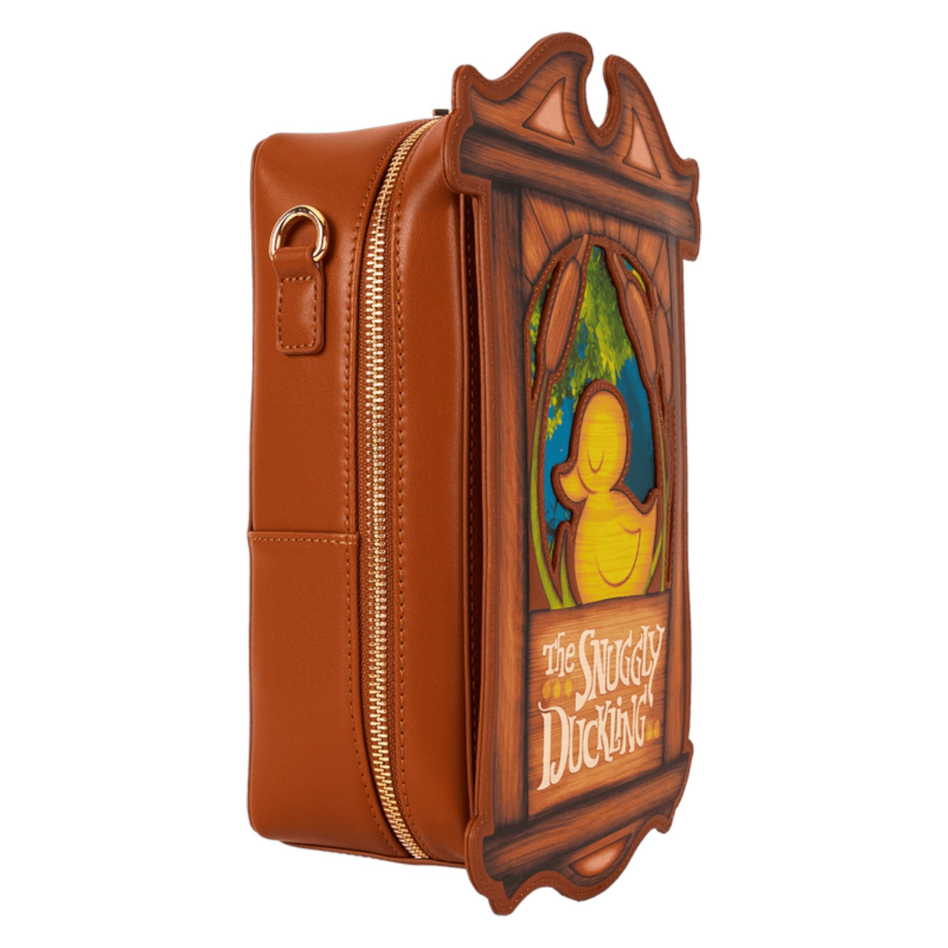 Crossbody bag with snuggly duckling illustration and 'The Snuggly Duckling' text, framed in wood a brown leather strap with gold hardware on a white background