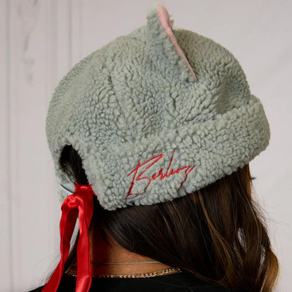 Light grey The Aristocats Berloiz Sherpa Beanie with red ribbon and on a plain background