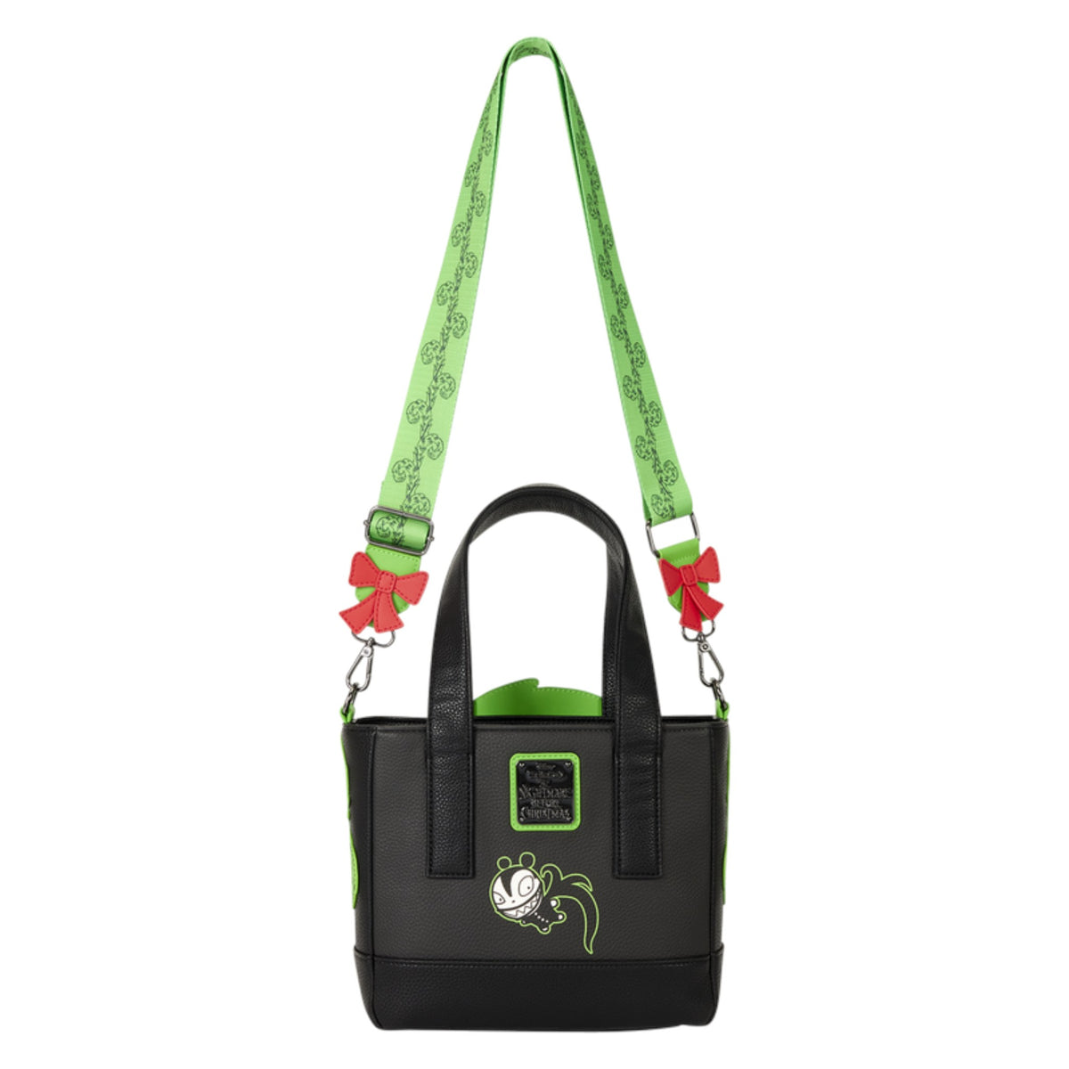 A black tote bag with a bright green patterned shoulder strap, green trim, and a cartoon character patch on the front, shown against a plain white background.