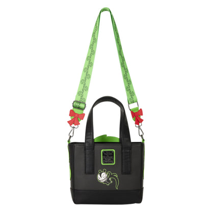 A black tote bag with a bright green patterned shoulder strap, green trim, and a cartoon character patch on the front, shown against a plain white background.