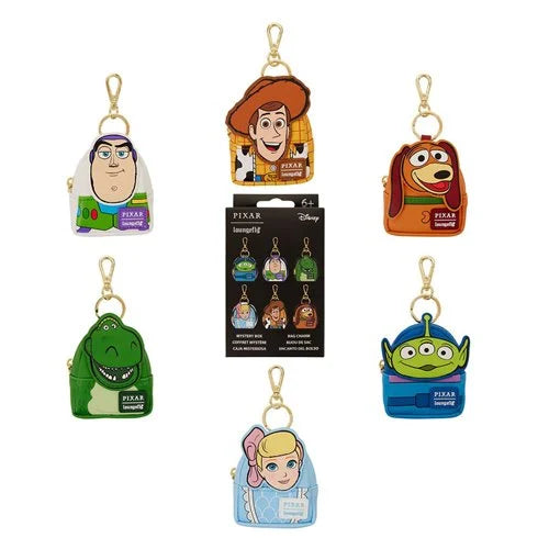 Set of Pixar-themed keychains with a packaging display on a white background