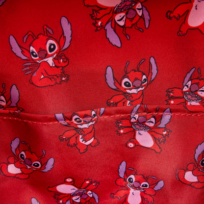 Close-up of inside of Red Loungefly Lilo & Stitch Leroy Cosplay Mini Backpack with Leroy character fabric pattern on a red background