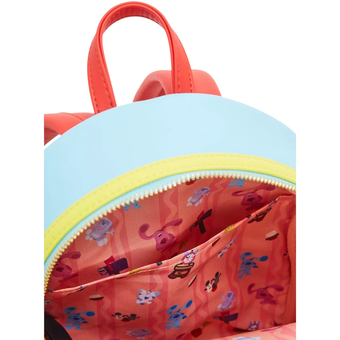 inside pattern of backpack with various characters on a red background