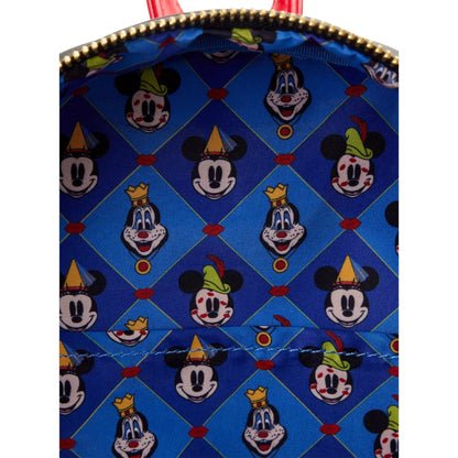 Patterned interior of a bag with mickey and friends character faces on a blue background