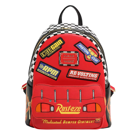 Red Lightning McQueen Rust-eze backpack with vintage-style patches on a white background