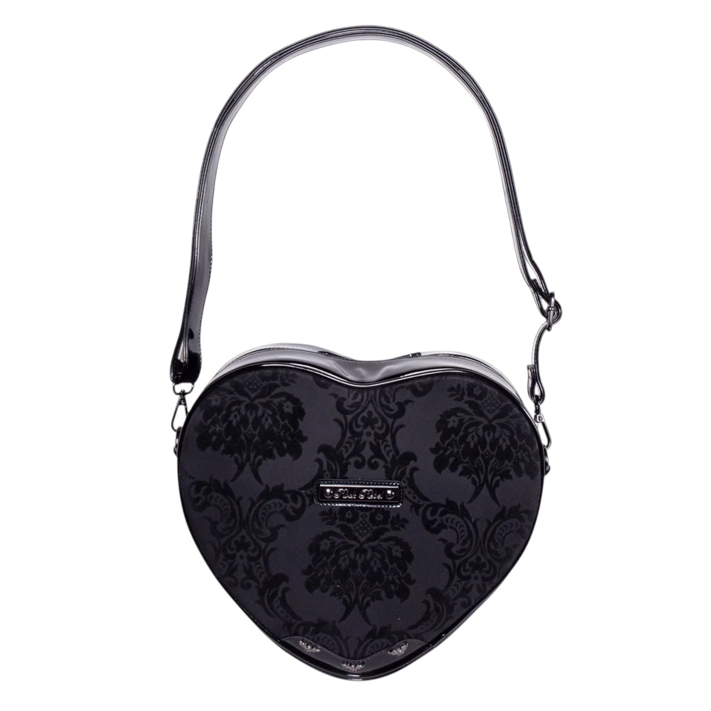 A black heart-shaped shoulder bag with a glossy damask pattern, featuring a silver-tone metal plaque on the front and a matching black strap, shown against a plain white background.