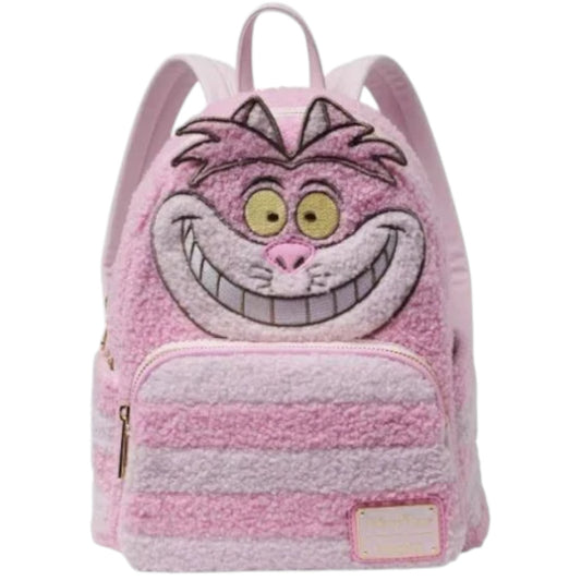 Pink backpack with a Cheshire Cat character face design on a white background