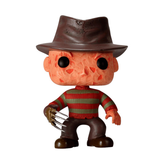 Toy figure of Freddy Krueger with a brown hat, red and green striped shirt, and clawed hand on a white background