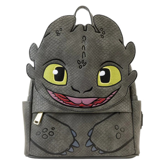 How To Train Your Dragon Toothless Cosplay Mini Backpack designed like a dragon with yellow eyes and a pink tongue on a white background