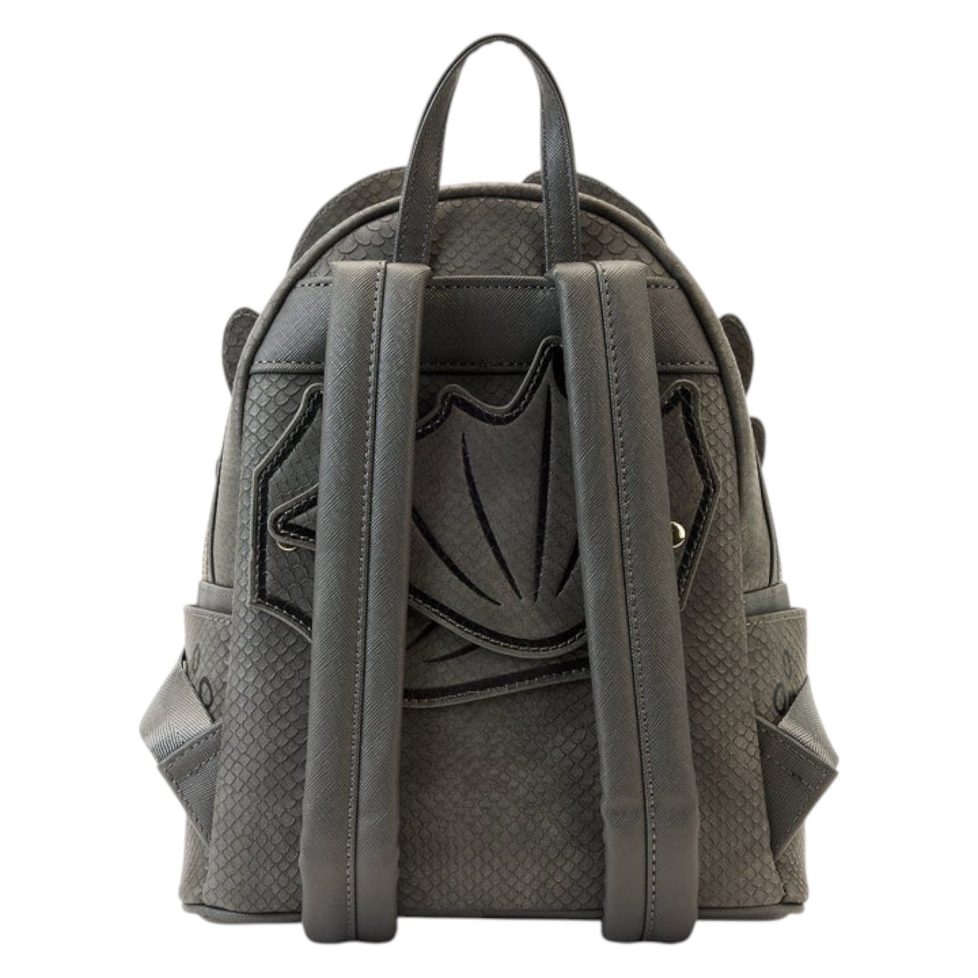 Gray How To Train Your Dragon Toothless Cosplay Mini Backpack designed like a dragon with yellow eyes and a pink tongue with a shield design on a white background