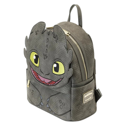How To Train Your Dragon Toothless Cosplay Mini Backpack designed like a dragon with yellow eyes and a pink tongue on a white background
