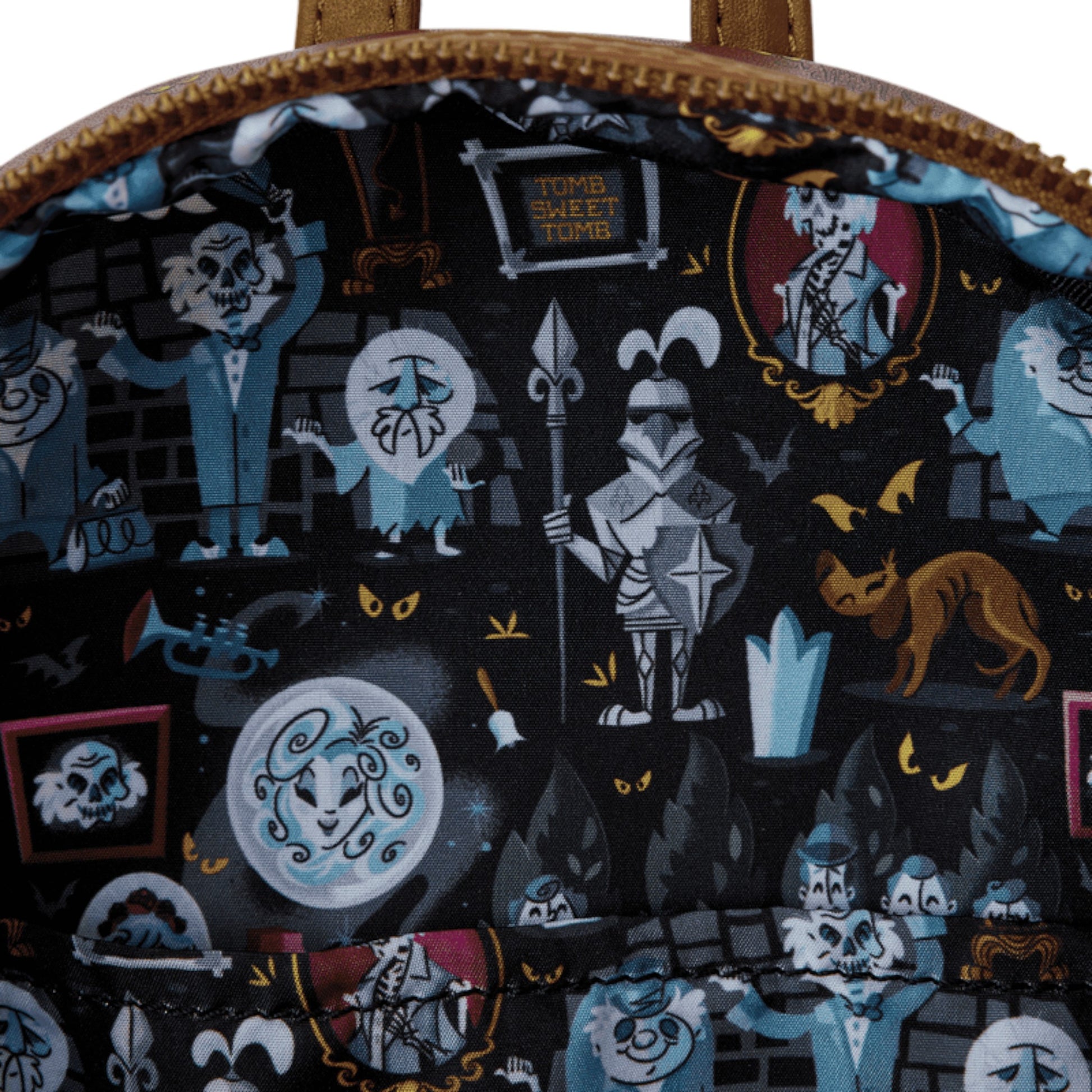 Backpack with Haunted Mansion-themed design featuring skeletons, cats, and other elements.
