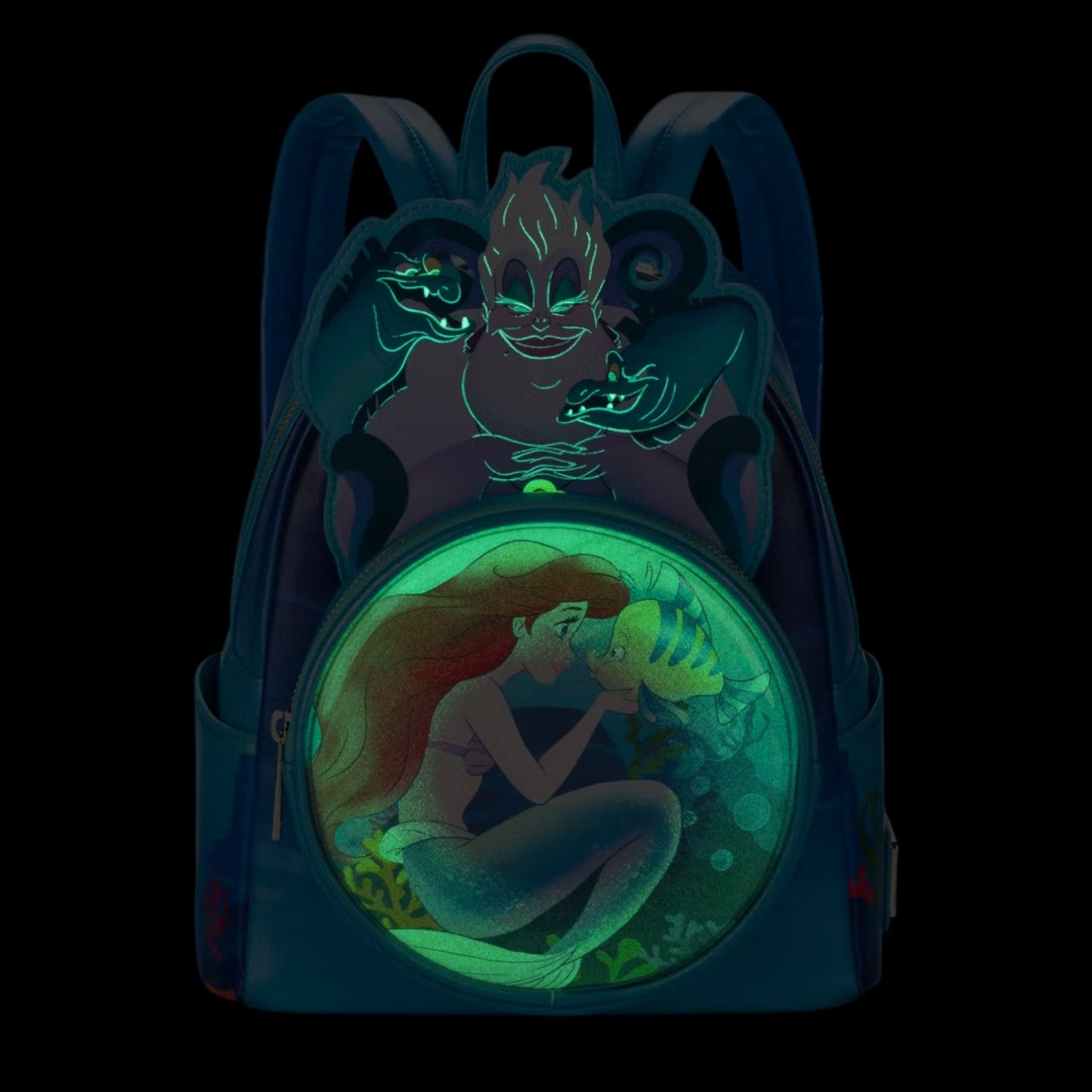 Backpack with glowing Ursula, her eels and Ariel design on a black background