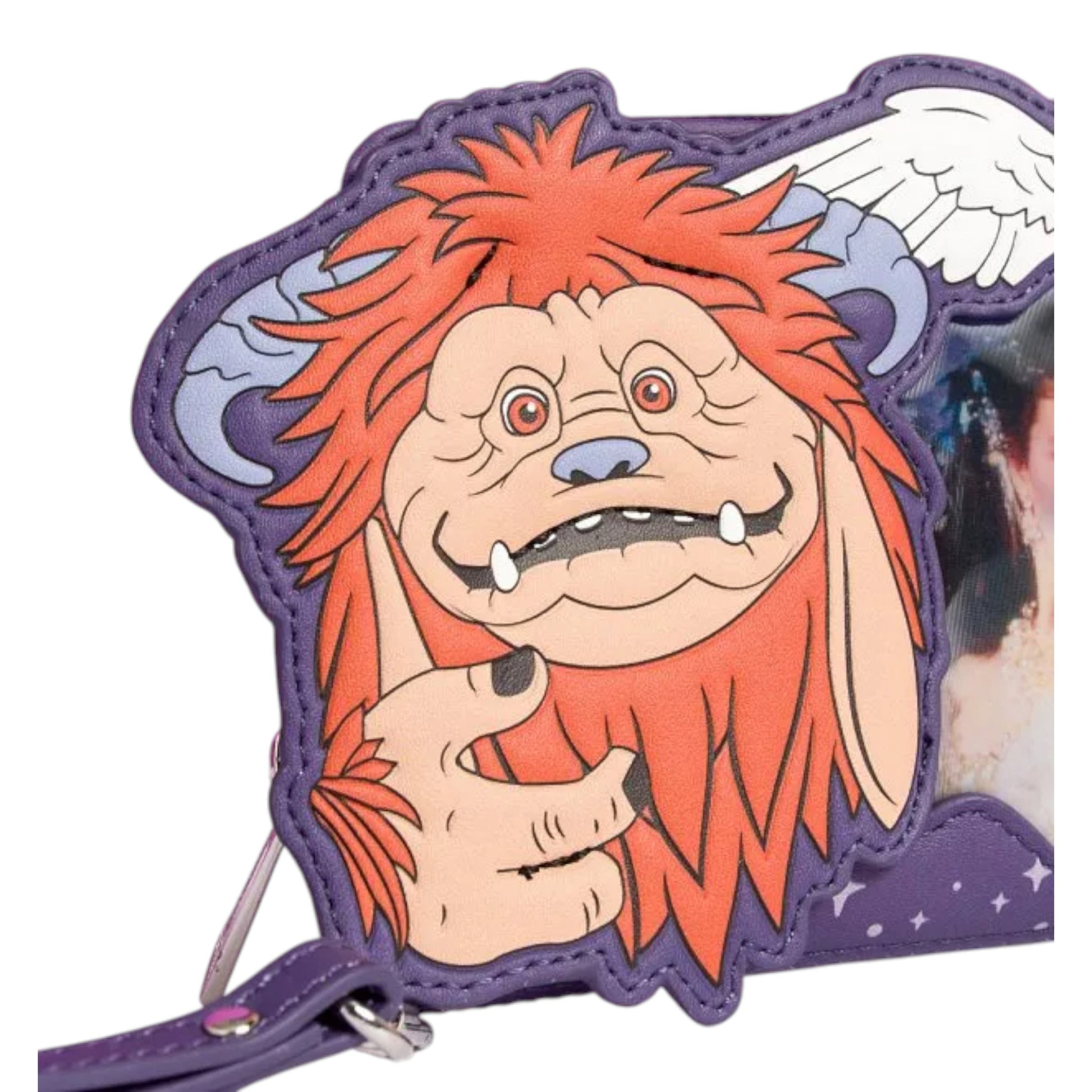 Ludo's face with red hair and a purple shell-like background