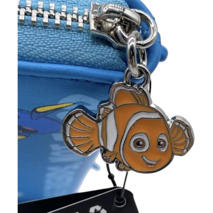 Side of Blue Loungefly Disney Pixar Finding Nemo Bruce Cosplay Wallet with Nemo character zipper charm on a blue bag 