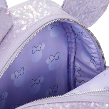 Close-up of a Sequin Opalescent Lavender bag with minnie mouse head patterns on a white background