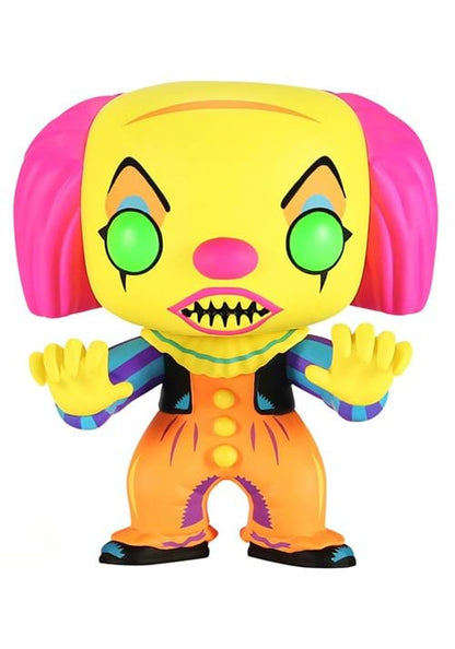  IT Pennywise toy figure with pink hair, yellow face, and orange outfit on a white background