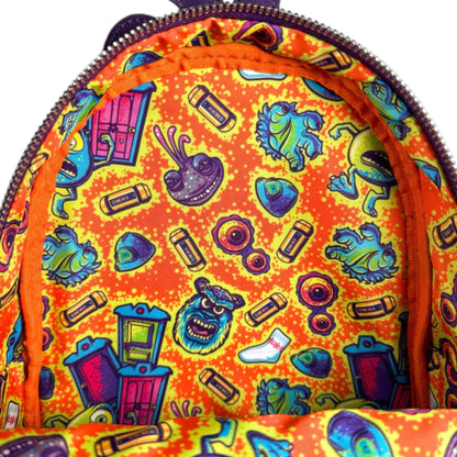 Colorful backpack with monsters inc character-themed design on an orange background