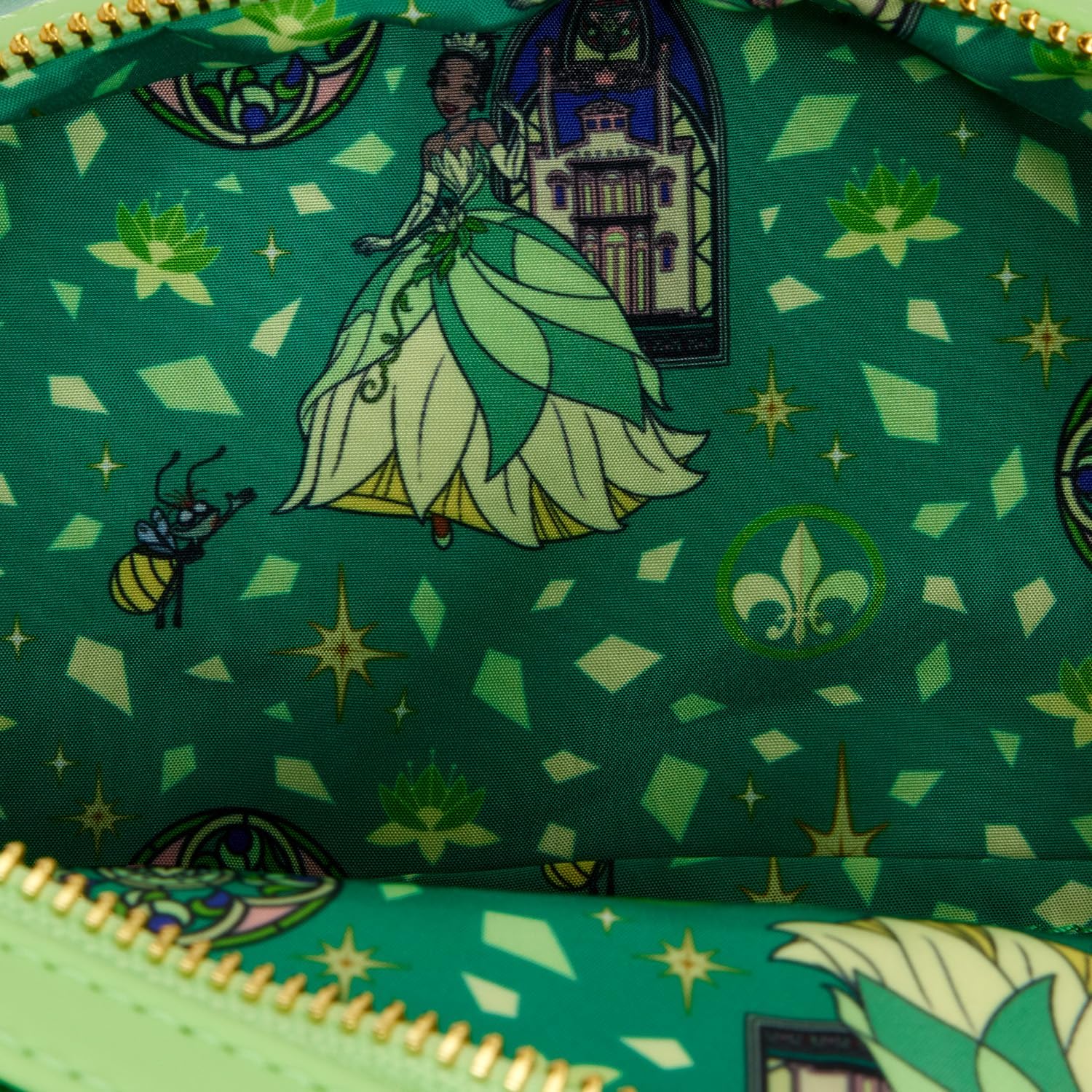 Green fabric with castle design, featuring Disney Tiana character design  in a green dress and a bee.