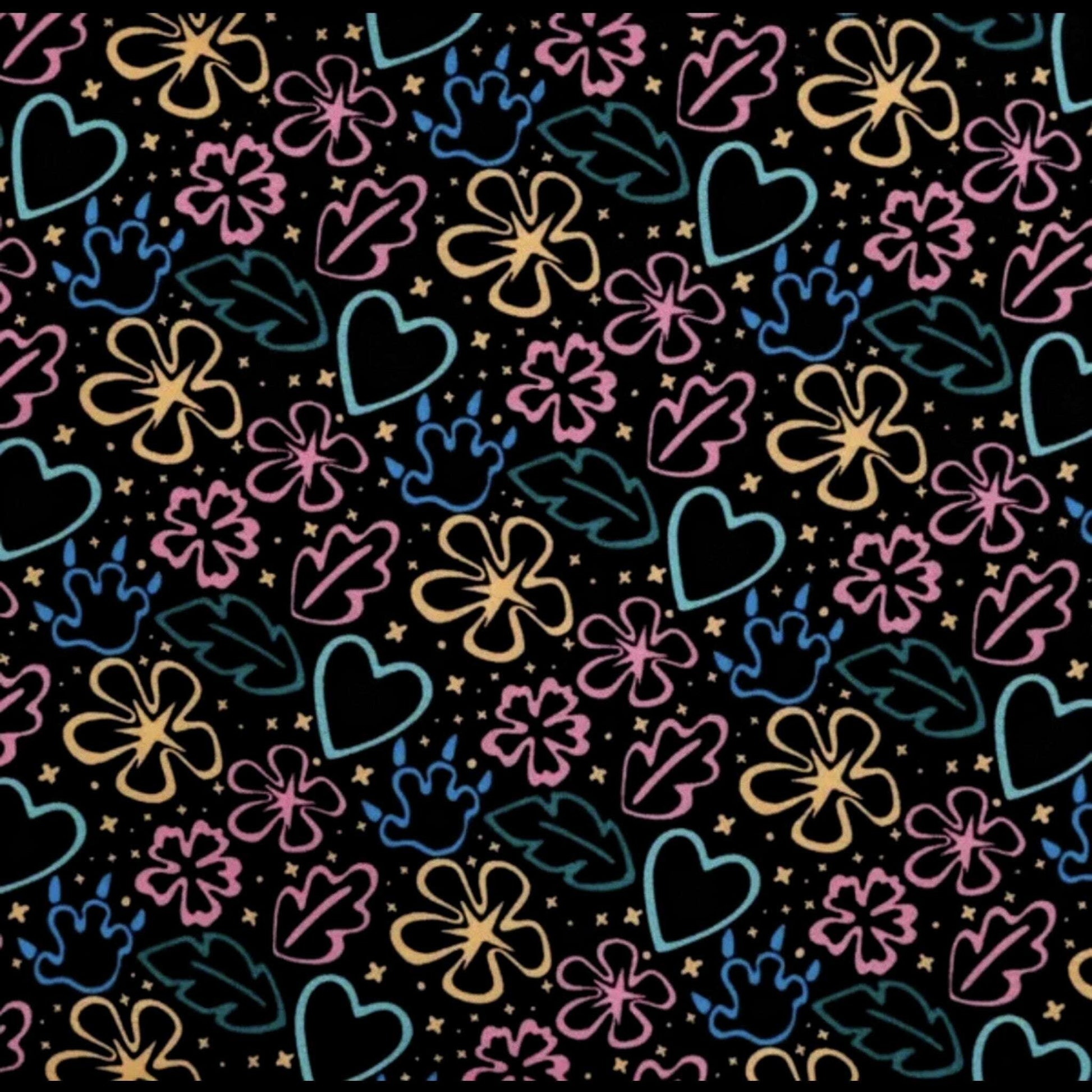 Colorful hand-drawn floral and heart patterns on a black background