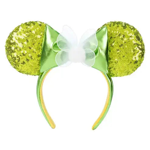 Green glittery mouse ears with a bow on a white background