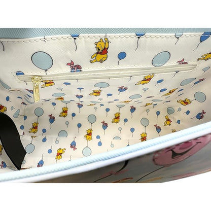 Winnie the Pooh Balloon Friends character-themed product with a zipper on a white background