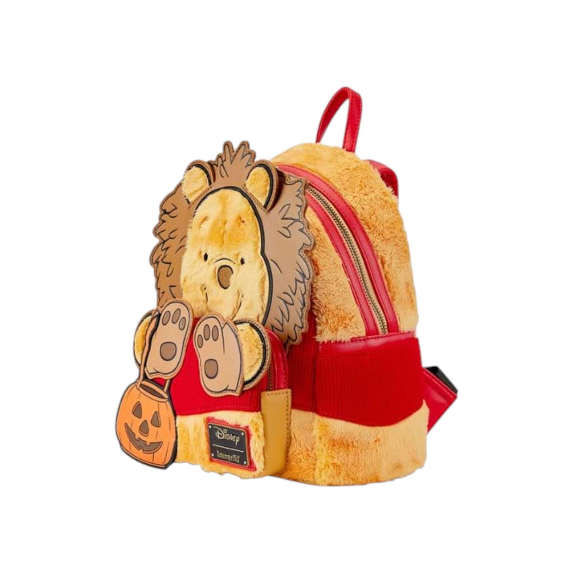 Plush backpack with Winnie the Pooh   design on a white background